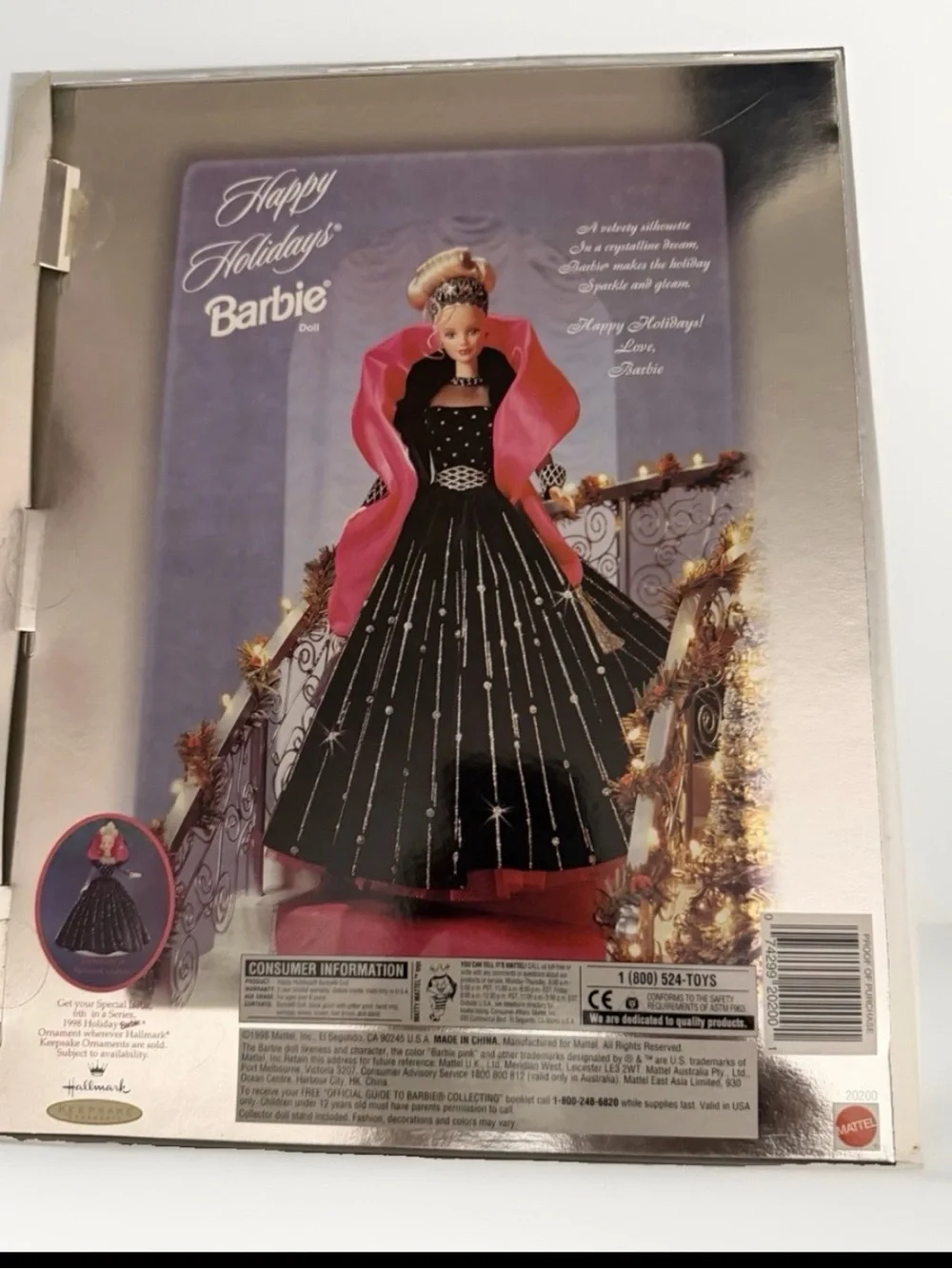 Barbie wears black